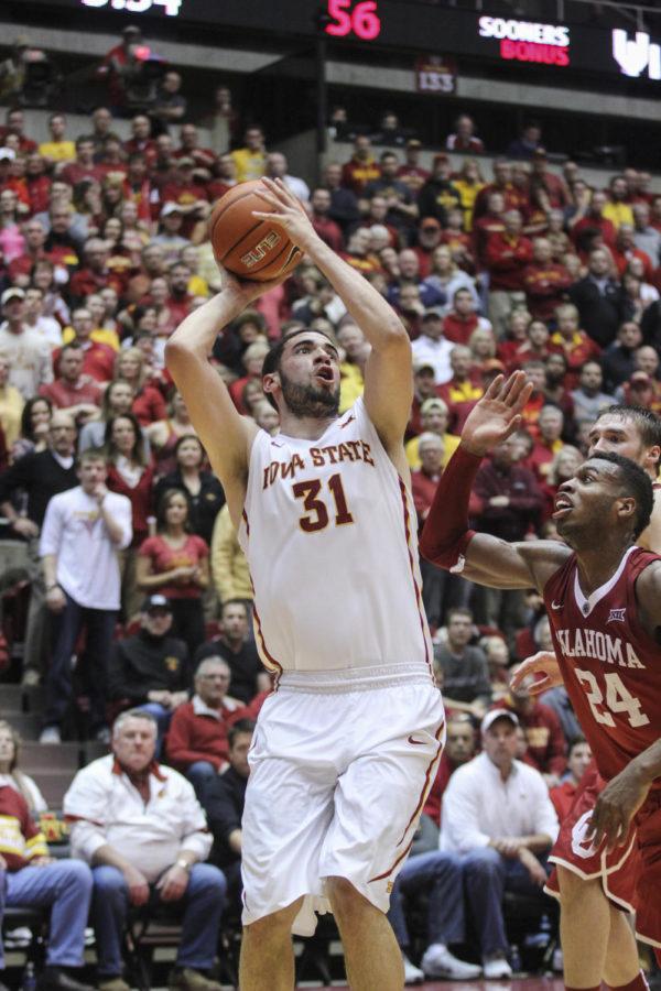 Junior forward Georges Niang shoots the ball during the game against No. 15 Oklahoma at Hilton Coliseum on March 2. The No. 17 Cyclones defeated the Sooners 77-70 after a rocky 18-point first half. Niang led the Cyclones with 23 points.