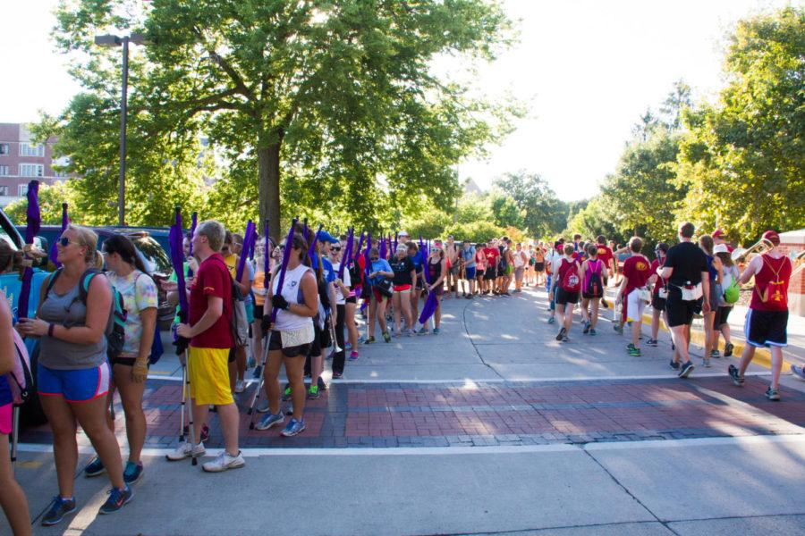 Band members line up for a sweet treat after marching around campus Aug. 23. The band is a key part of life around campus and sporting events. 