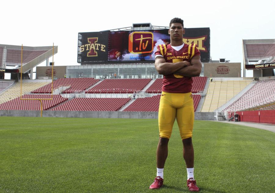 Wide receiver Allen Lazard poses at football media day.