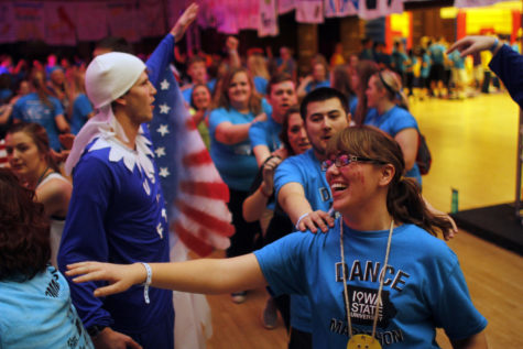 Student dancers start a conga line during Iowa States annual Dance Marathon on Jan. 24. Students danced and stood for 12 hours in support of those who cannot. Students raised $444,253.18 for the Childrens Miracle Network Hospitals.