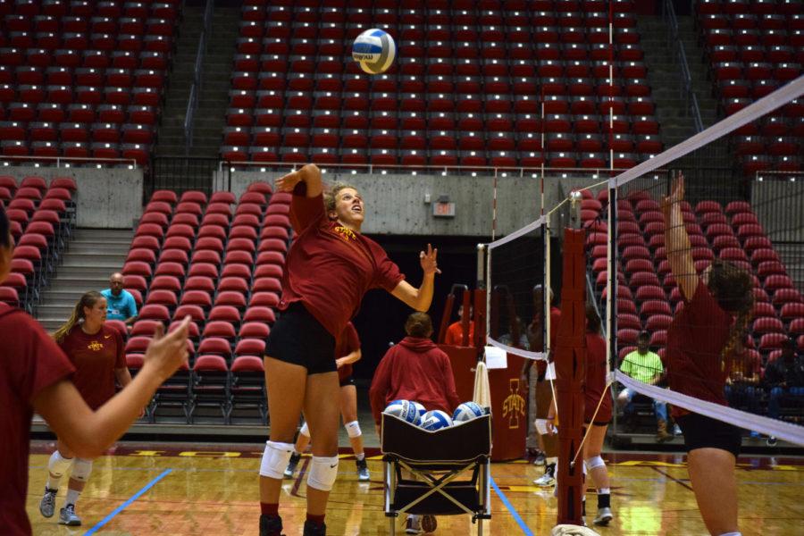 Junior Ciara Capezio goes up for a kill at the teams open practice on Tuesday, August 18 at Hilton Coliseum.