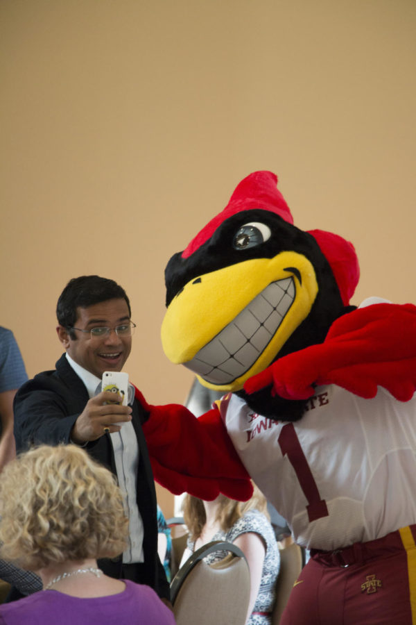 A graduate student takes a selfie with Cy at the 2015 graduate orientation. Over 400 students registered for the orientation. 