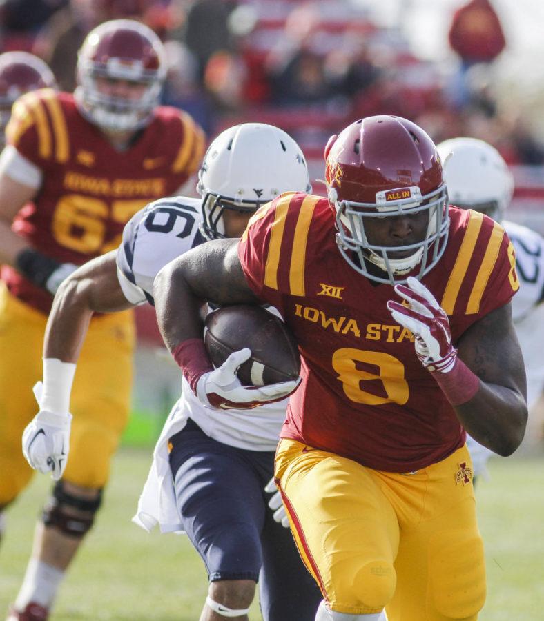 Redshirt sophomore wide receiver DVario Montgomery runs the ball against West Virginia on Nov. 29 at Jack Trice Stadium. The Cyclones fell to the Mountaineers 37-24. Montgomery had 71 yards. 