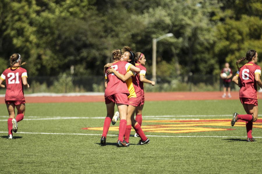 Junior Koree Willer hugs sophomore Maribell Morales after the first Iowa State goal. Morales scored the goal from 20 yards out and Willer had the assist. The Cyclones fell to NDSU 2-3 in overtime.