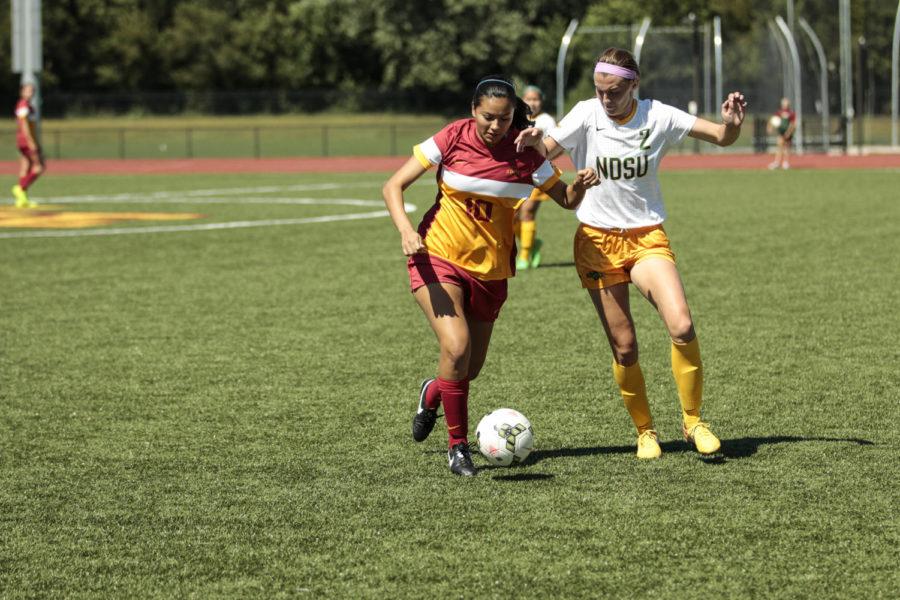 Sophomore Maribell Morales tries to keep the ball away from her NDSU opponent. The Cyclones lost 2-3 in overtime.