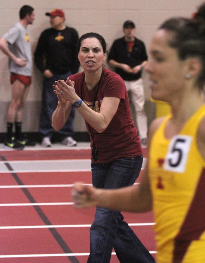 Assistant coach Andrea Grove-McDonough cheers on redshirt senior Samantha Bluske during the ISU Classic on Feb. 14 at Lied Recreation Center.
