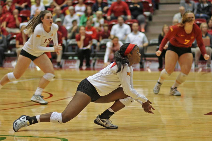 Sophomore Monique Harris (8) digs a serve during the match against Dayton on Aug 28. The Cyclones beat Dayton 3 sets to 1.