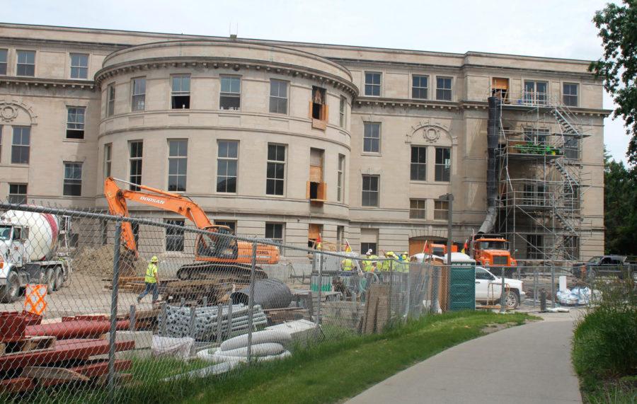 A construction crew works on the renovations of the 110-year-old Marston Hall building on June 4, 2015. Sixty percent of the project is demolition. 