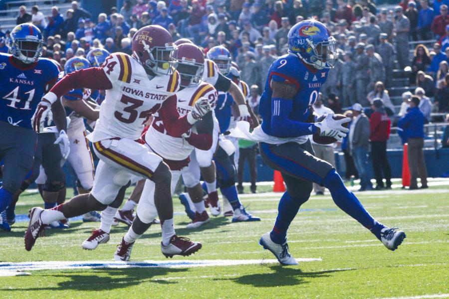 Members of the ISU defense chase down Kansas wide receiver Nigel King on Nov. 8 at Lawrence, Kan. Iowa State fell to the Jayhawks 34-14.