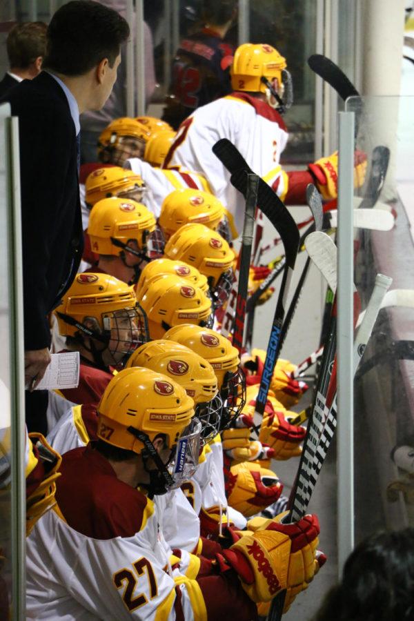 The+Cyclone+Hockey+team+watches+the+game+Friday+evening.+Iowa+State+hosted+the+Southern+Illinois-Edwardsville+Cougars%2C+where+they+won+9-0.