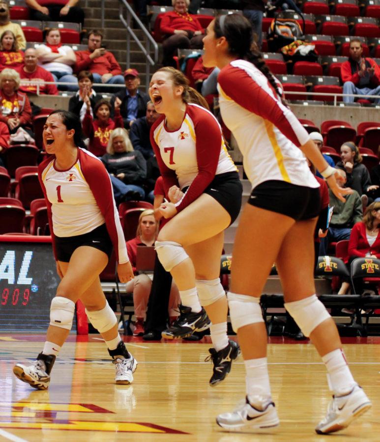 Sophomore Jenelle Hudson, sophomore Caitlin Nolan, and redshirt sophomore Tory Knuth celebrate after winning a hard fought point during Iowa States 3-2 victory over Texas Tech on Oct. 30 at Hilton Coliseum.