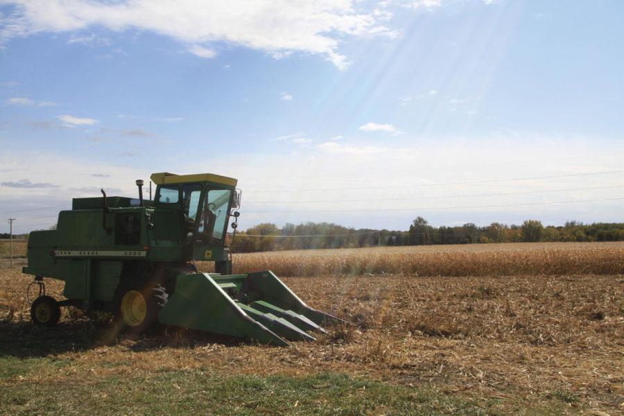 Latest government crop yield predictions give grain farmers optimism as the harvest season reaches its peak in Iowa, corn and soybean experts say at Iowa State University this week.