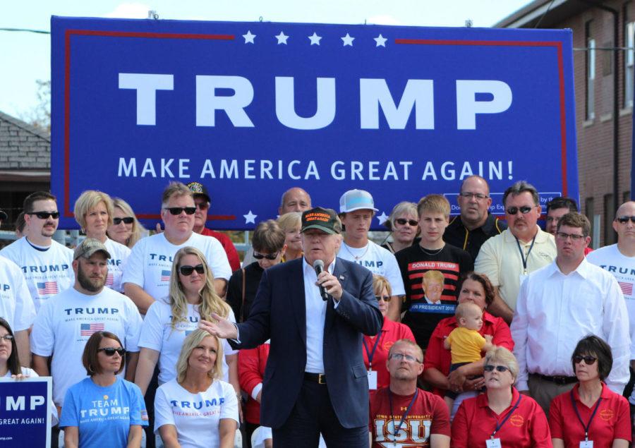 Donald Trump with supporters behind him, speaking at the Boone County Pufferbilly Days on September 12. 