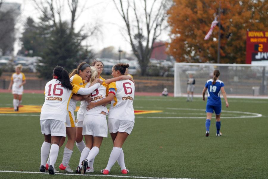 The ISU womens soccer team celebrates after scoring its third goal of the match against Drake on Sunday, Oct. 14, at the Cyclone Soccer Complex. The Cyclones defeated the Bulldogs 3-0. 
