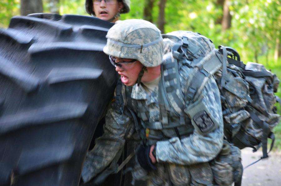 One of five Army ROTC platoons who met for a team building exercise. They worked on carrying a large tire across Brookside Park on Sep. 16. 