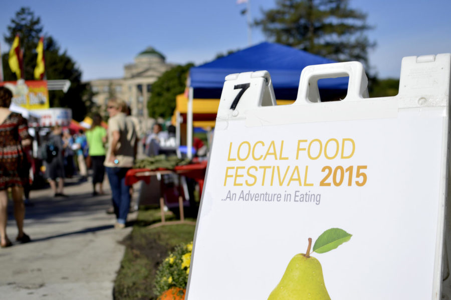 A sign welcomes students to the Local Food Festival on Central Campus Sept. 18.