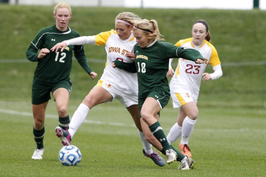 Freshman+forward+Koree+Willer+cuts+between+two+Baylor+players+towards+the+goal%C2%A0during+Iowa+States%C2%A01-0+loss+to+Baylor+in+the+Big+12+Championship+tournament+game+at+the+Swope+Soccer+Village+on+Nov.+6.