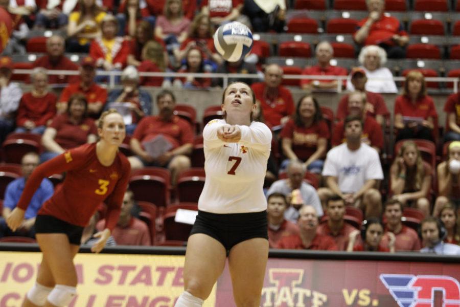 Senior Caitlin Nolan (7) bumps the ball while redshirt Junior Morgan Kuhrt (3) looks on during Iowa States match against North Dakota on Wednesday, Aug. 29 at Hilton Coliseum. The Cyclones defeated the Fighting Sioux, 3-1.