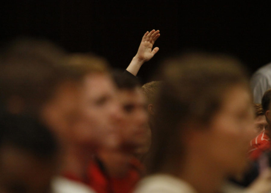 Josh Newell/Iowa State Daily A student raises her hand to ask a question of Senator Rand Paul during a rally Friday September 11, 2015 in the Sun Room of the Memorial Union in Ames, Iowa. Senator Paul spoke for about an hour to a standing room only audience, who gave him a standing ovation once he finished speaking.