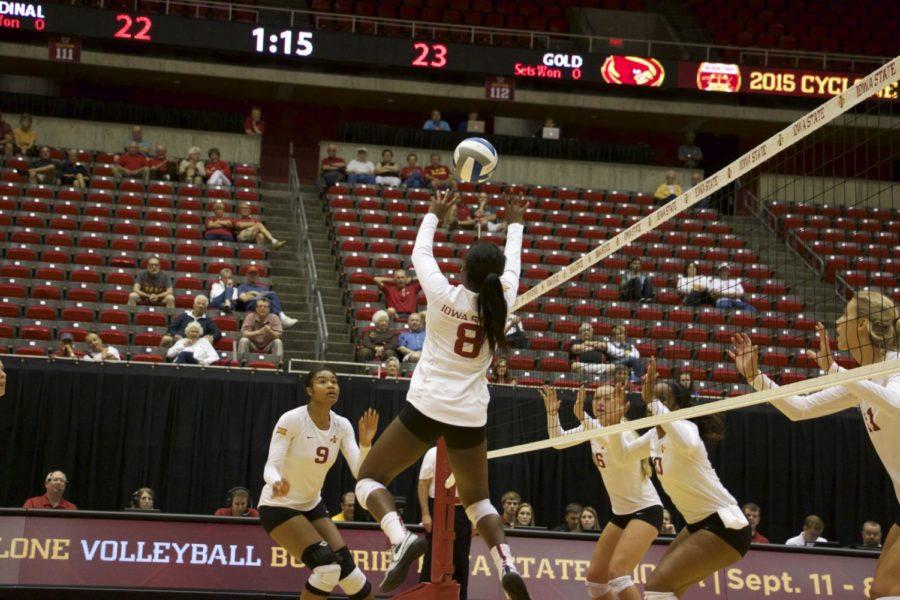 Sophomore setter Monique Harris sets the ball to redshirt sophomore Samara West during the Cardinal and Gold scrimmage match on Aug. 22. 