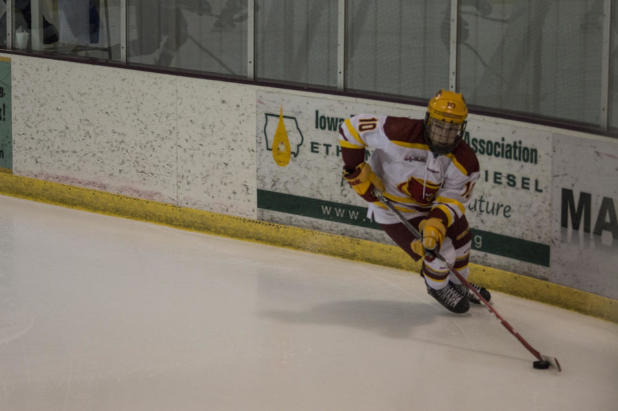 Sophomore Eero Helanto returns the puck during the first period of the Cyclone hockey match against Midland University on Feb. 28. The match ended at 13-0.