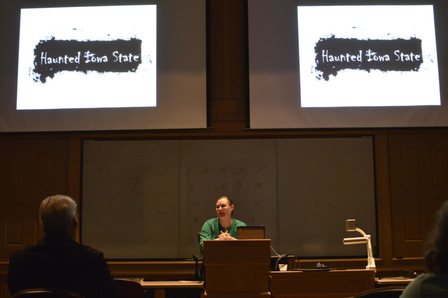 Amanda Hill, former student and former University Museums worker, tells ghost stories from all over Iowa and within Iowa State University during an event at Morrill Hall on Thursday.