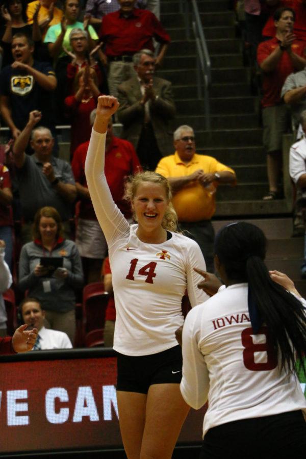 Freshman Jess Schaben reacts to scoring the game winning point Wed. evening against Kansas State. The Cyclones beat the Wildcats 3-0.
