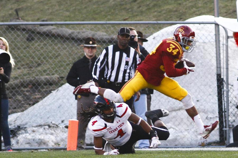 Sophomore defensive back Nigel Tribune picks off a Texas Tech pass on Nov. 22 at Jack Trice Stadium. The team suffered its fourth consecutive conference loss against the Red Raiders, with a final score of 34-31.