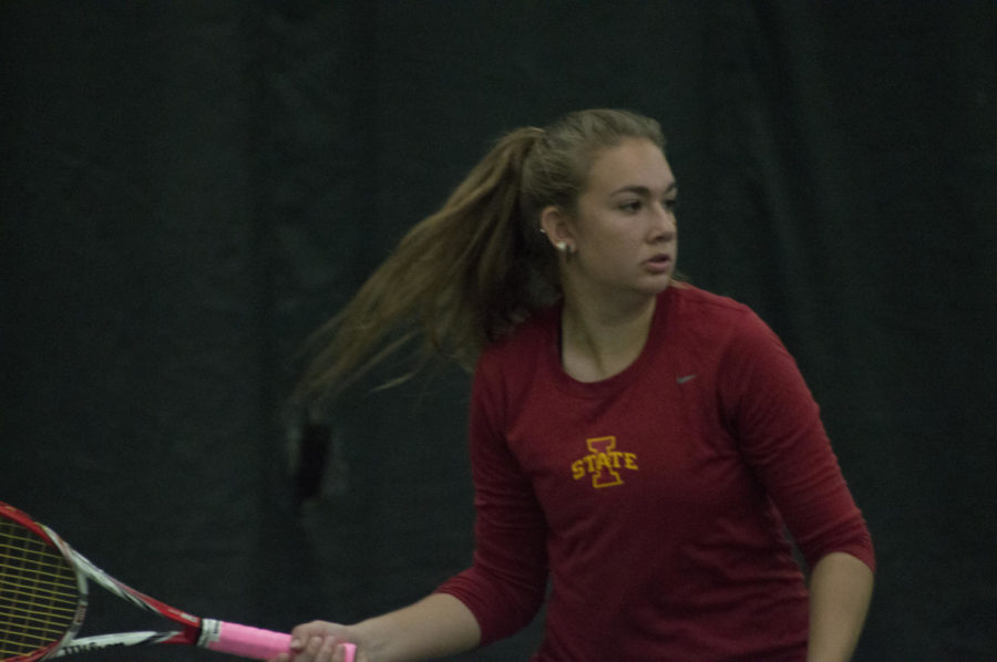 Sophomore Samantha Budai returns the ball during the tennis match between Iowa State and Texas on March 27. Texas won the match 4-2.