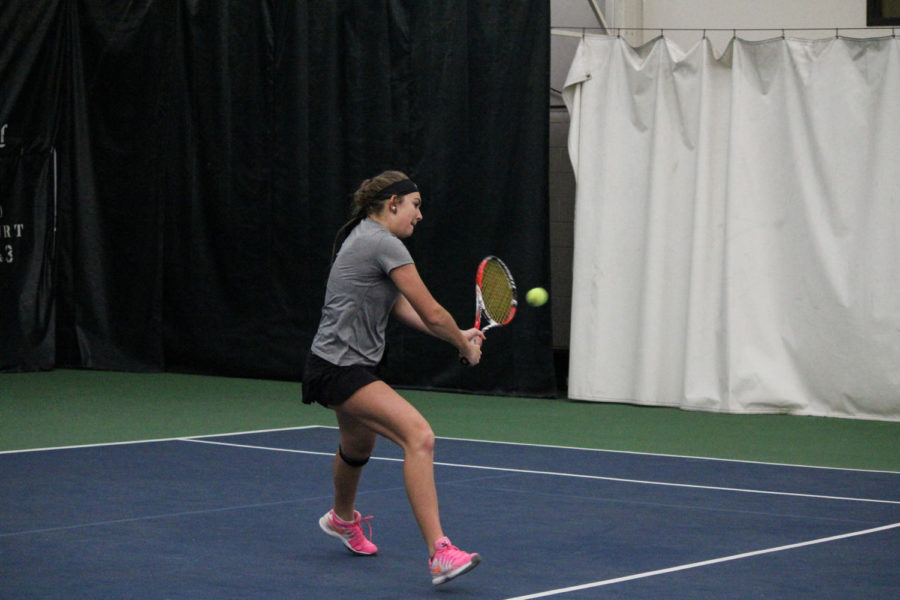 Sophomore Samantha Budai returns the ball during her singles match against Oklahoma on Feb. 22, 2015. Budai won her match, but the Cyclones lost 4-2.