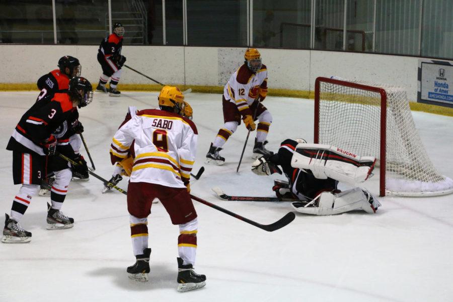 The Cyclones shoot a goal during the game against the Illinois State Redbirds Saturday night. The Cyclones would go on to beat the Redbirds 6-3.
