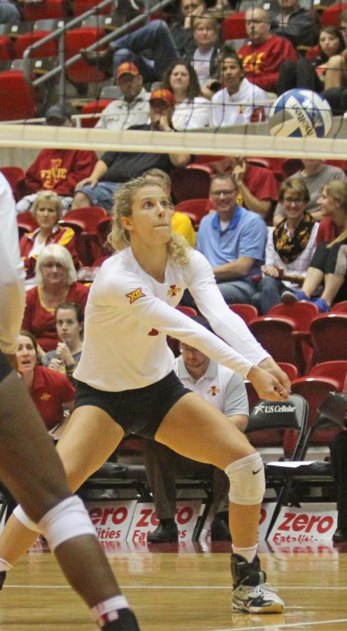 Junior Ciara Capezio bumps the volleyball against WVU. The Cyclones swept the mountaineers in three sets.