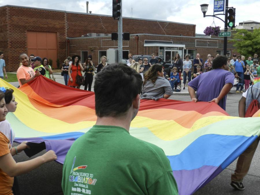 Supporters of the LGBT community show their colors in the 2013 Pride Parade
