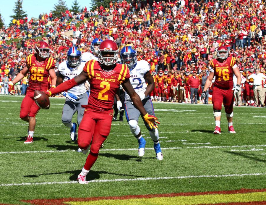 Running back Mike Warren scores a touchdown during the game against Kansas Saturday afternoon. The Cyclones beat the Jayhawks 38-13. 