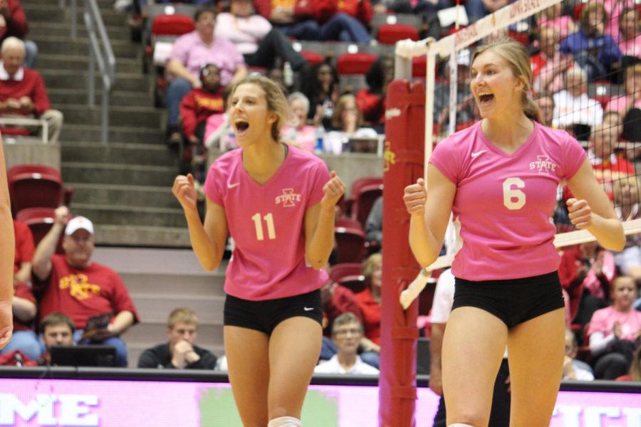 From left, Ciara Capezio, junior outside hitter and Alexis Conaway, sophomore outside hitter/middle blocker, cheer for ISU. ISU won 9-5 against TCU on Oct. 17.