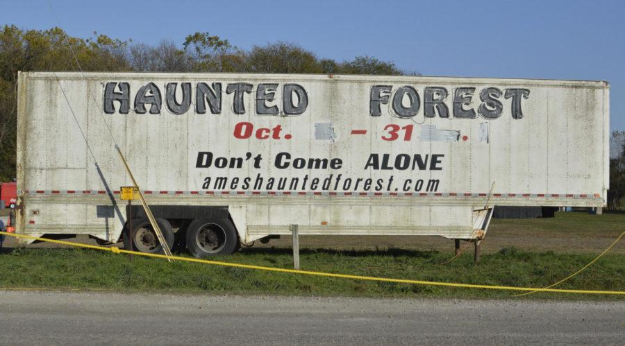 The Ames Haunted Forest displays a sign at the entrance to their parking lot warning the public, "Don't come alone." The forest is a horror experience that is opened annually around Halloween time.