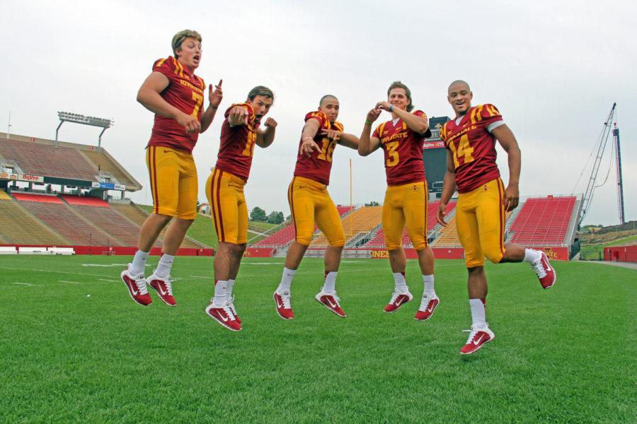 Iowa States quarterbacks — from left, redshirt freshman Joel Lanning, redshirt junior Sam Richardson, freshman Kyle Starcevich, redshirt sophomore Grant Rohach and freshman Darius Lee-Campbell — will play during the 2014-15 football season. The football media day took place Aug. 10 at Jack Trice Stadium and Bergstrom Football Complex.
