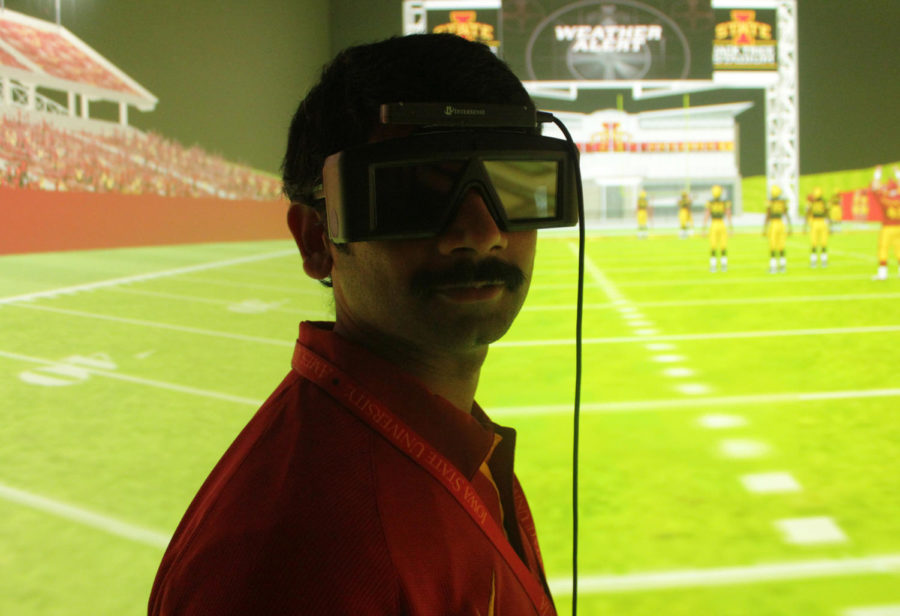 Virtual Reality Center media day on Oct. 22, staff research scientist, Vijay Kalivarapu, testing the virtual game. 