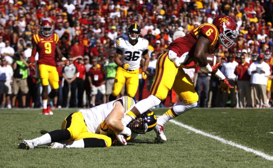 Iowa States Tyler Brown (6) breaks a tackle from University of Iowas Josey Jewell (42) Saturday September 12, 2015 during the first quarter in Jack Trice Stadium in Ames, Iowa. The Cyclones led the Hawkeyes 17 to 10 going into the half. Josh Newell/Iowa State Daily 