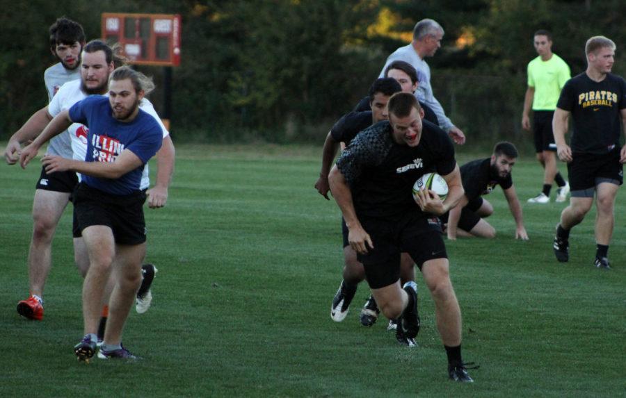 Nathan Ihrig seen sprinting with the ball during the scrimmage at Tuesday nights practice. The Mens Iowa State Rugby team practices at the Southwest Complex on Tuesdays and Thursdays.