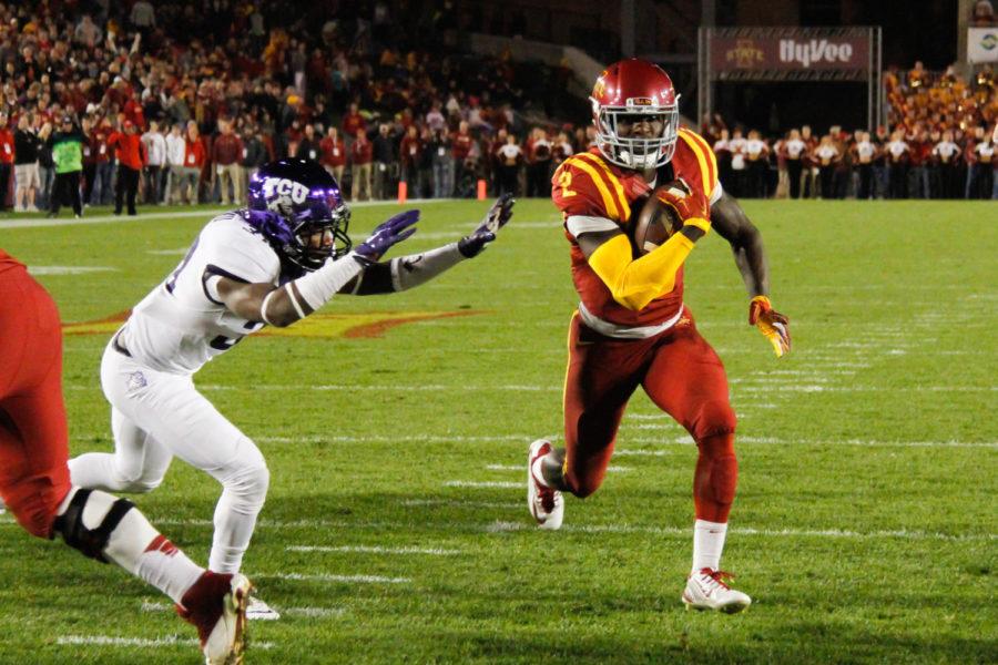 Running back Mike Warren runs the ball into the end zone for a touchdown in the first quarter against No. 3 TCU on Oct. 17 at Jack Trice Stadium.
