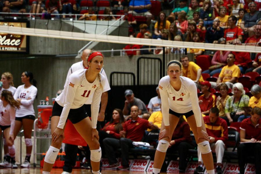 Ciara Capezio, junior, and Jess Schaben, freshman, wait for the ball during the game against Nebraska Saturday afternoon. The Cyclones lost 3-1.