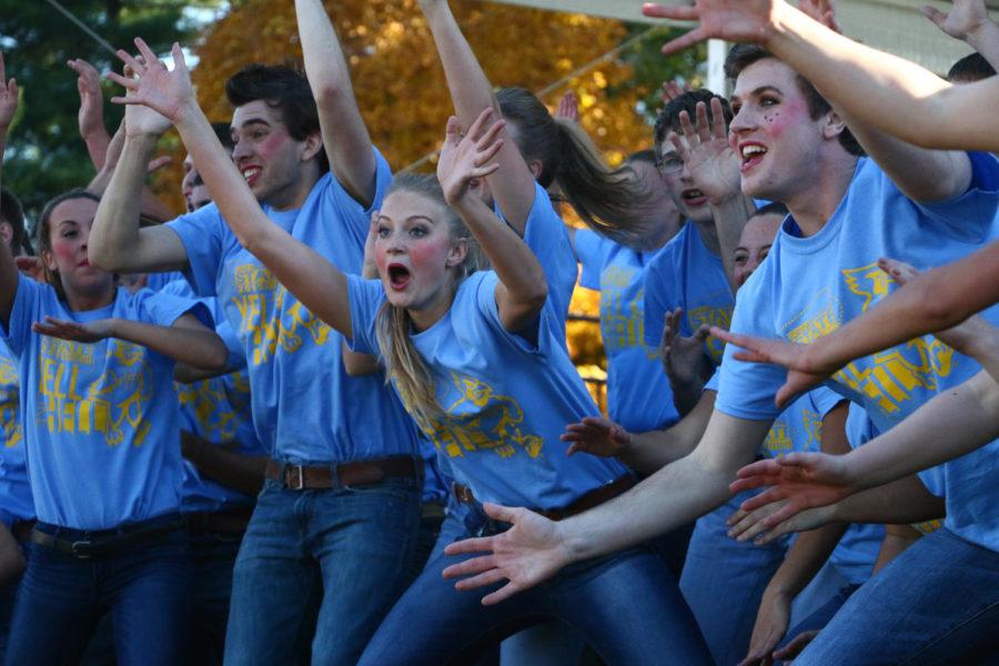 Members of the greek community perform a skit during the first round of Yell Like Hell on Sunday. The event, which has been an annual tradition since 1963, pairs fraternities and sororities together, where they then produce a routine that conveys the Homecoming theme. 