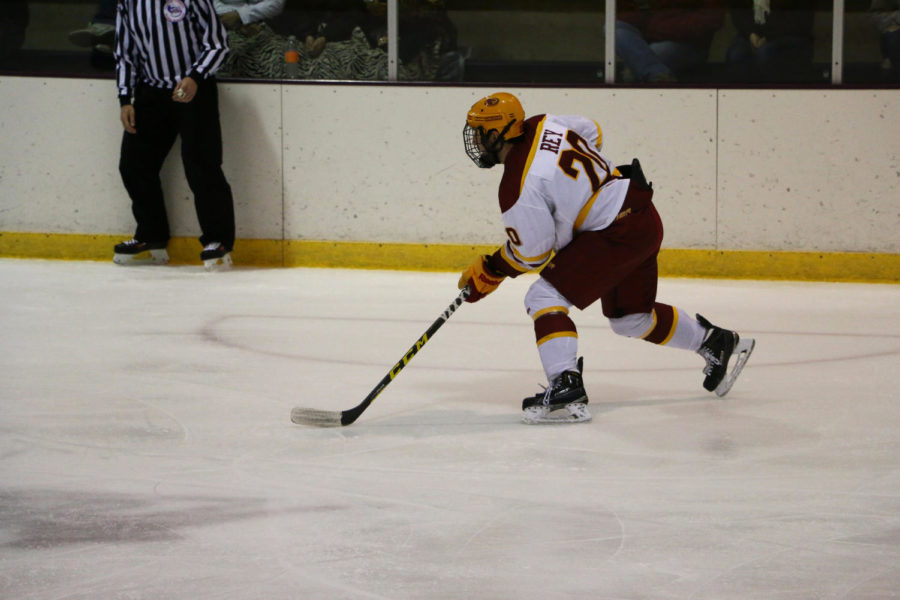 Cyclone Hockey forward Chase Rey prepares to shoot the puck during the game against Illinois State Oct. 17, 2015. The Cyclones would go on to beat the Redbirds 4-2.