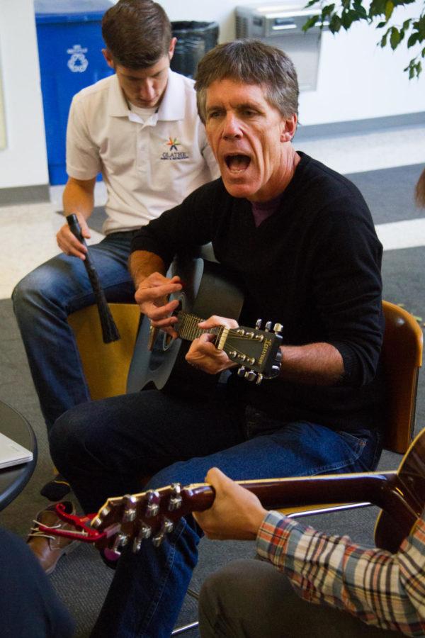 Michael Martin, associate professor of landscape architecture and leader of The Lawn Chairs, performs during the lunch hour Fri. Oct. 9th. Martin started the band three years ago during the landscape architecture's traveling field program Savanna Studio. 