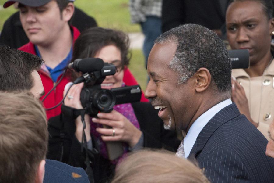 Presidential candidate Dr. Ben Carson speaks with supporters after speaking at an event at Alpha Gamma Rho Saturday morning. Carson, who recently took lead in the polls, spoke about his stance on key issues regarding his presidential campaign, as well as his reasons for running for president. 