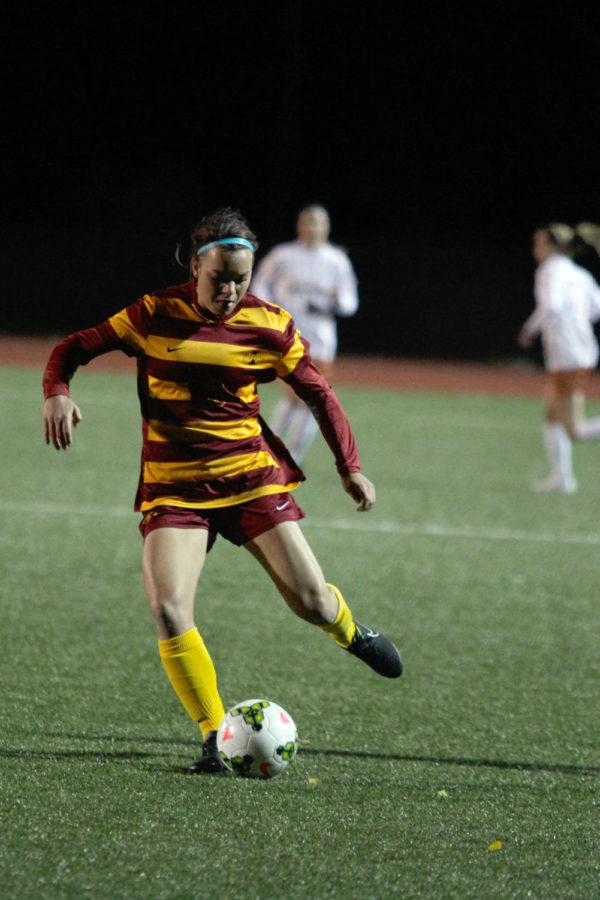 Madi Ott controls the ball at midfield during the soccer game against Texas on Oct. 3. The team improved from its 2-0 loss to Baylor from earlier in the week, but fell to Texas 1-0 during a cold and windy night at the Cyclone Sports Complex.