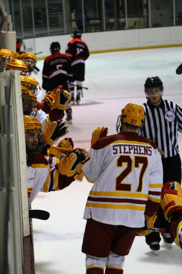 Cyclone Hockey senior forward Alex Stephens celebrates his point during the game against the Illinois State Redbirds on Friday night. The Cyclones would go on to win 4-2.