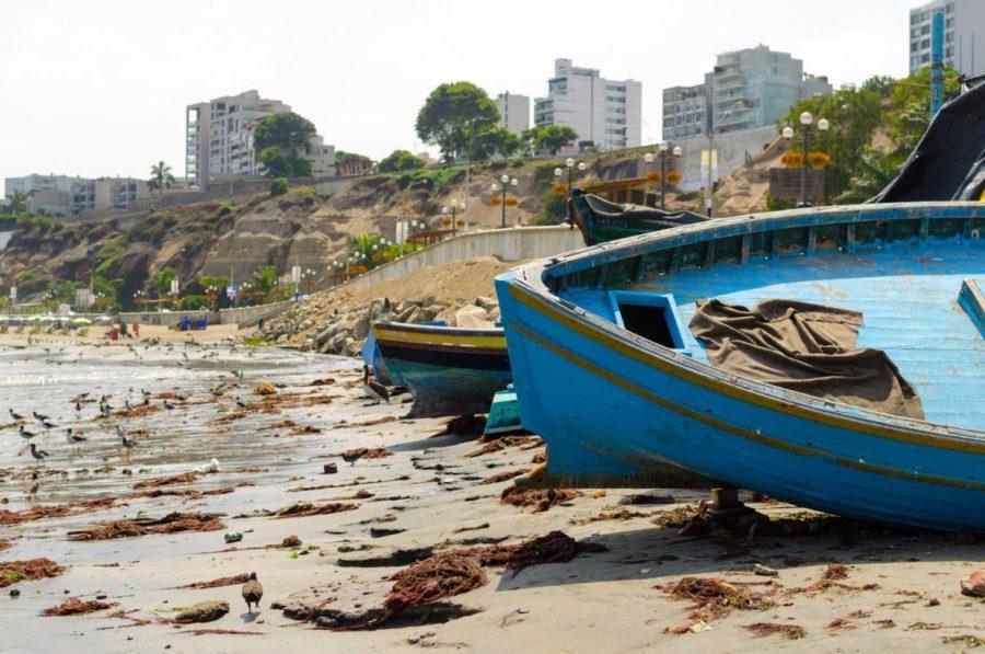 Abandoned fishing boats near the Chorrillos wharf in Peru. Studio Andino, open to advanced students in the College of Design, plans to revamp the wharf within the next few years.