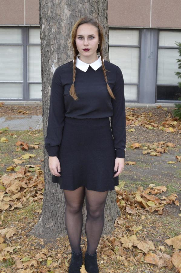 Dark, demented Addams family member Wednesday Addams is a simple DIY costume for students this Halloween. A black dress, white Peter Pan collar and dark lipstick are the essential elements for creating this costume.